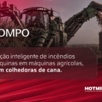 Máquina colheitadeira em campo com o texto Prevenção Inteligente em Colhedoras de Cana